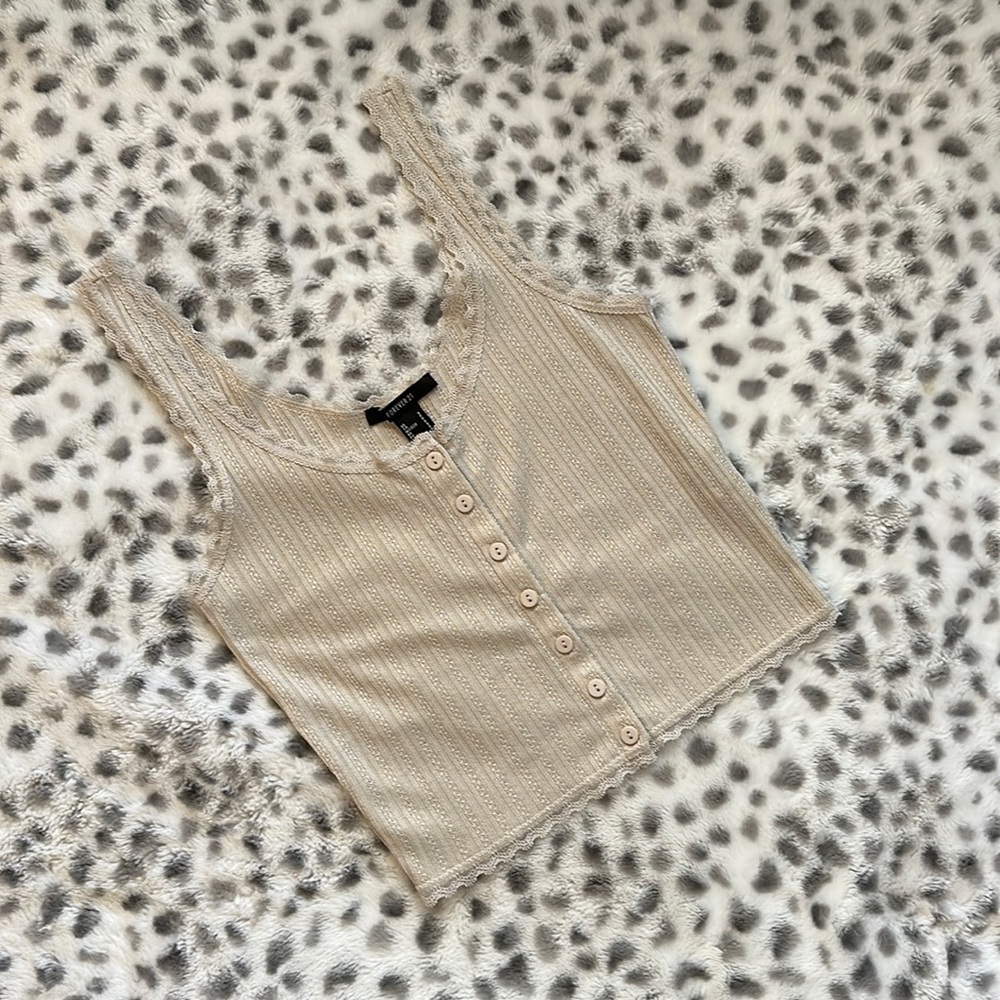 This is a cream tank top from forever 21 size small